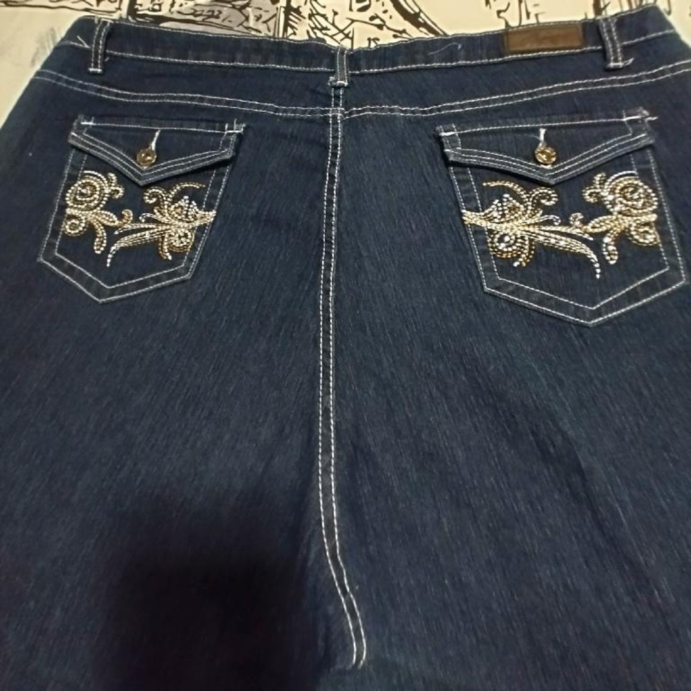 Dark denim Blue Jeans ( button missing)